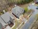 Aerial view of the home's roof and landscaping in a quiet suburban neighborhood at 251 Manous Way, Canton, GA 30115