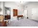 Bedroom with chair and table on carpet, decorative furniture, with a view of the bathroom at 251 Manous Way, Canton, GA 30115