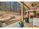 Covered patio with ceiling fan, outdoor seating, grill, and view of the backyard at 251 Manous Way, Canton, GA 30115