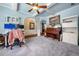 Spacious living room featuring high ceiling, open archways, and large windows at 251 Manous Way, Canton, GA 30115