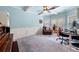 Bright living room featuring paneling, large windows, and an open floor plan at 251 Manous Way, Canton, GA 30115