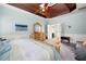Large main bedroom with ceiling fan, neutral colors, and dresser at 251 Manous Way, Canton, GA 30115