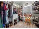 Organized walk-in closet with custom shelving, drawers, and ample storage space at 251 Manous Way, Canton, GA 30115