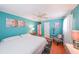 Bright bedroom boasts blue walls, white curtains, and hardwood floors for a refreshing and relaxing space at 3530 Embry Cir, Atlanta, GA 30341