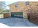 Attached garage providing convenient parking with an adjacent wall at 3530 Embry Cir, Atlanta, GA 30341