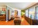 Bright living room featuring hardwood floors, neutral walls, and stylish mid-century furniture at 3530 Embry Cir, Atlanta, GA 30341