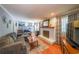 Spacious living room boasts a fireplace and access to other rooms at 3530 Embry Cir, Atlanta, GA 30341