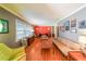 Comfortable living room with hardwood floors, unique decor, and abundant natural light at 3530 Embry Cir, Atlanta, GA 30341