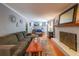 Comfortable living room with brick fireplace and hardwood floors at 3530 Embry Cir, Atlanta, GA 30341