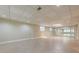 Finished basement featuring recessed lighting, tile floors, and a wall of mirrors at 370 Royal Birkdale Ct, Johns Creek, GA 30097