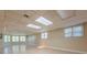 Spacious basement with tile flooring, neutral walls, and many windows allowing for natural light at 370 Royal Birkdale Ct, Johns Creek, GA 30097