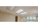 Finished basement with recessed lighting, tile floor, basement windows and a partial kitchen at 370 Royal Birkdale Ct, Johns Creek, GA 30097