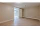 Finished basement room featuring tile floors, neutral walls and an open doorway to the main area at 370 Royal Birkdale Ct, Johns Creek, GA 30097