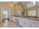 Bright bathroom boasting dual sink vanity, large mirrors, and walk-in shower at 370 Royal Birkdale Ct, Johns Creek, GA 30097