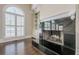 Living room featuring a fireplace with a black marble hearth at 370 Royal Birkdale Ct, Johns Creek, GA 30097