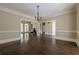 Spacious living room featuring hardwood floors and an open layout at 370 Royal Birkdale Ct, Johns Creek, GA 30097