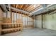 Unfinished basement features exposed utilities and wood framing, ready for customization at 370 Royal Birkdale Ct, Johns Creek, GA 30097