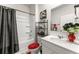Clean and well-maintained bathroom with shower and tub combination and elegant decor at 4823 Layton Dr, Lithia Springs, GA 30122