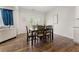Cozy dining area with a wooden table set and access to the outdoor space with lots of light at 4823 Layton Dr, Lithia Springs, GA 30122