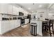 Bright kitchen featuring white cabinetry, granite countertops, and stainless steel appliances, ideal for cooking at 4823 Layton Dr, Lithia Springs, GA 30122