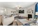Comfortable living room with plush seating, a fireplace, and tasteful decor for relaxing and entertaining at 4823 Layton Dr, Lithia Springs, GA 30122
