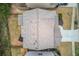 Aerial view of the house showing the roof and surrounding landscaping at 5036 Maplecliff Dr, Sugar Hill, GA 30518