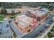 Aerial view of the Eagle Theater in Sugar Hill, Georgia, surrounded by parking, retail shops, and an amphitheater at 5036 Maplecliff Dr, Sugar Hill, GA 30518