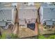 Aerial view of the property with a trampoline in the backyard at 5036 Maplecliff Dr, Sugar Hill, GA 30518