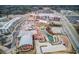 Overhead view of the town center showcasing green spaces and pedestrian-friendly areas at 5036 Maplecliff Dr, Sugar Hill, GA 30518