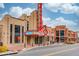 Street-level view of the Eagle Theater in Sugar Hill, featuring its marquee, architectural details and adjacent shops at 5036 Maplecliff Dr, Sugar Hill, GA 30518