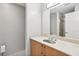 Bathroom features wood vanity, white marble countertop, and updated fixtures at 250 Park Avenue West Nw # 313, Atlanta, GA 30313