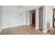Open dining area with hardwood floors, a modern pendant light, and seamless flow to the kitchen, great for entertaining at 250 Park Avenue West Nw # 313, Atlanta, GA 30313