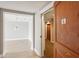 Condo entryway with an open floor plan, showcasing modern lighting and bright living space at 250 Park Avenue West Nw # 313, Atlanta, GA 30313