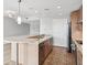 Modern kitchen with stainless steel appliances, a breakfast bar, and stylish cabinets, perfect for cooking and entertaining at 250 Park Avenue West Nw # 313, Atlanta, GA 30313
