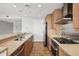 Well-equipped kitchen with stainless steel appliances, sleek countertops, and ample cabinet space, perfect for cooking enthusiasts at 250 Park Avenue West Nw # 313, Atlanta, GA 30313