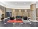 Lobby features stone floors, designer wallpaper, comfortable seating, and large windows at 250 Park Avenue West Nw # 313, Atlanta, GA 30313
