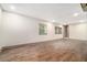 Spacious basement featuring tile floors, recessed lighting, and two windows at 2695 Peeler Rd, Dunwoody, GA 30360