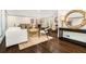 Stylish open-concept living room with hardwood floors and lots of natural light throughout the house at 2695 Peeler Rd, Dunwoody, GA 30360