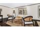Bright living area with hardwood floors, neutral walls and natural light at 2695 Peeler Rd, Dunwoody, GA 30360