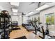Well-equipped gym with modern exercise equipment, ample natural light, and a spacious workout area at 3980 Allegretto Cir, Atlanta, GA 30339