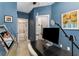 Inviting office space with blue walls and lots of natural light for a bright, cheerful work environment at 3980 Allegretto Cir, Atlanta, GA 30339