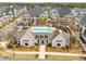 Aerial view of a community pool with lounge chairs and well-maintained landscaping in a luxury residential area at 3980 Allegretto Cir, Atlanta, GA 30339