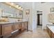 Bathroom features double sinks, a soaking tub, beautiful tile work, and a walk-in closet at 880 Crossfire Nw Rdg, Marietta, GA 30064