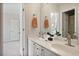 Bright double sink bathroom with large mirror and views of hall and shower at 880 Crossfire Nw Rdg, Marietta, GA 30064