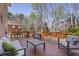 Spacious deck with outdoor seating, overlooking backyard and trees at 880 Crossfire Nw Rdg, Marietta, GA 30064