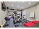 Home gym featuring a treadmill, exercise bike, and free weights at 880 Crossfire Nw Rdg, Marietta, GA 30064