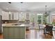 Open kitchen with stainless steel appliances, granite countertops, hardwood floors, and eat in breakfast nook at 880 Crossfire Nw Rdg, Marietta, GA 30064
