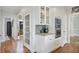 Galley-style kitchen with stainless steel appliances, granite countertops and white shaker cabinets at 880 Crossfire Nw Rdg, Marietta, GA 30064