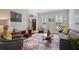 Cozy living room featuring a colorful rug, stylish furniture, and bright natural light at 880 Crossfire Nw Rdg, Marietta, GA 30064