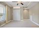 Spacious carpeted room with a window and a double door closet at 880 Crossfire Nw Rdg, Marietta, GA 30064
